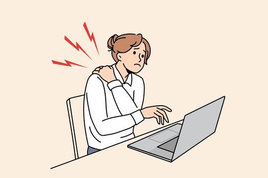 Unhealthy businesswoman suffer from backache working on computer