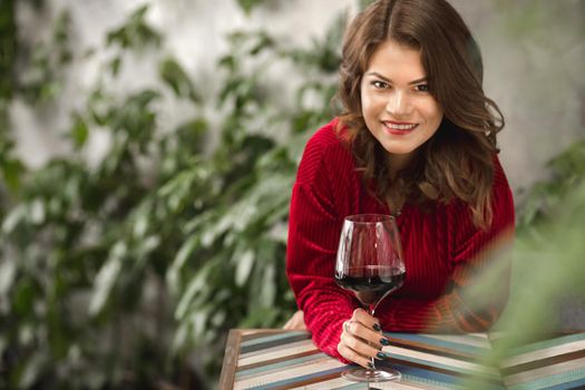 Young girl at a red wine tasting