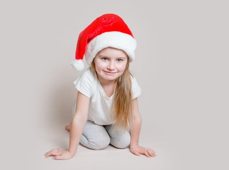 Little girl in santa claus hat