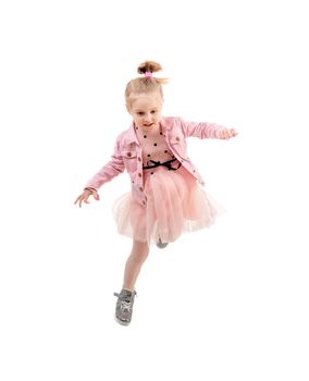 Funny girl jumping high, expressing herself, isolated