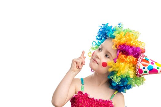 Funny little girl in multicolored wig