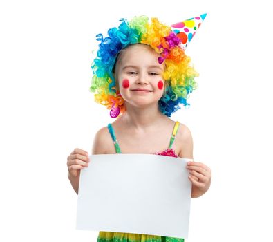 Girl in clown wig holds blank paper, isolated on white background