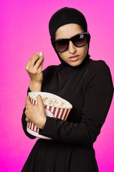 arab woman entertainment cinema popcorn fashion model ethnicity
