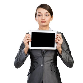Businesswoman holding tablet computer with blank screen. Beautiful woman in business suit show tablet PC near her face. Corporate businessperson isolated on white background. Digital technology layout