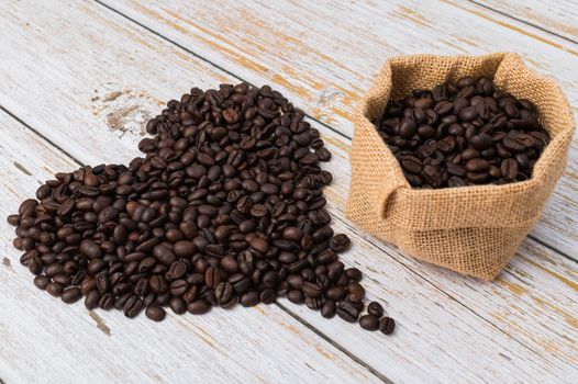 Coffee beans arranged in a heart shape.Love drinking coffee