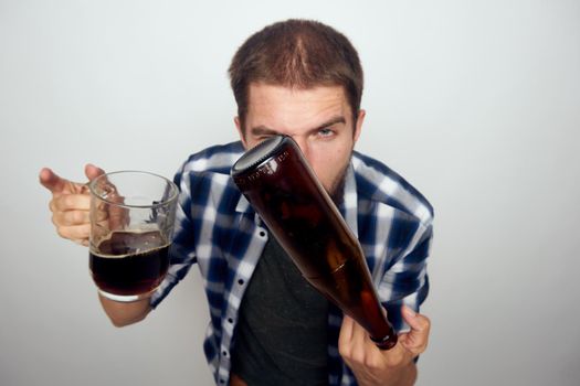 drunk man drinking beer alcohol emotion light background