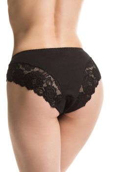 girl in black lace panties, back view, half-length shot on a white background