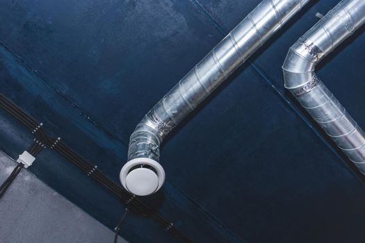 Ventilation pipe system at the ceiling of an industrial enterprise or plant premises
