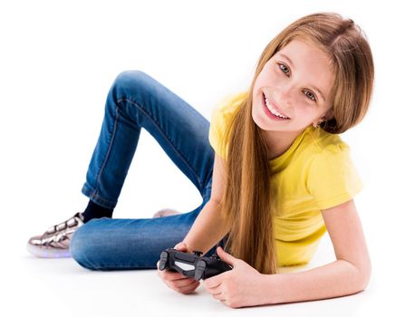 girl lying with joystick, tired from playing games