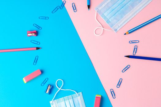 School stationery items and medical face mask