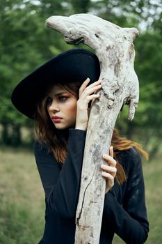 woman in witch costume halloween forest staff gothic