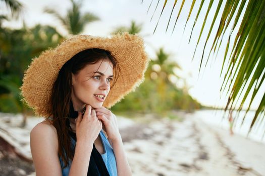 woman in swimsuit by the ocean island sun tropics