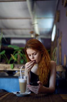 pretty woman in cafe drink communication relaxation. High quality photo