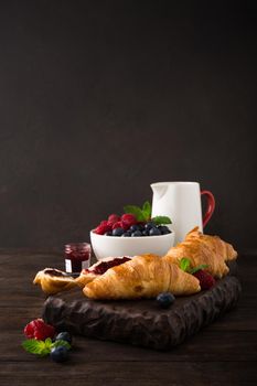 Delicious breakfast with fresh croissants