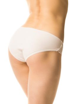 fit girl in panties on a white background, half-length shot