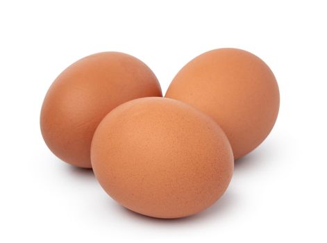 Brown chicken eggs isolated on a white background
