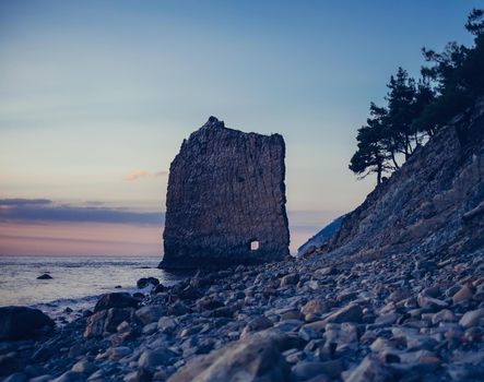 Rock Sail on pebble coast of Black sea