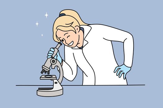 Woman scientist do experiment look in microscope