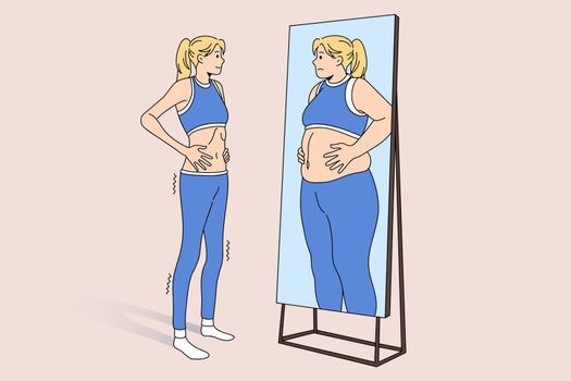 Unhappy skinny girl look in mirror see fat reflection