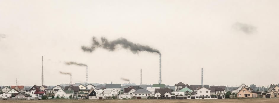 Dirty smoke from chimneys or pipes of a factory or industrial enterprise. Pollution of the environment and ecology