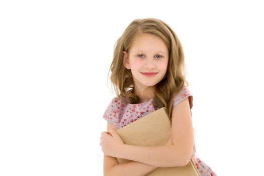 Little girl with a book. Isolated over white background