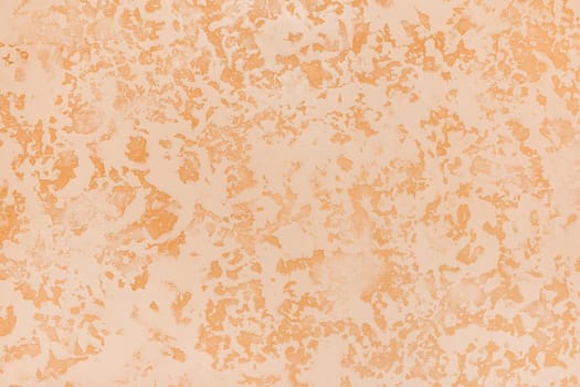 Light abstract sand plaster pattern wall texture orange stucco background
