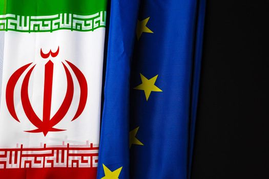 Flags of Iran and European Union flag together