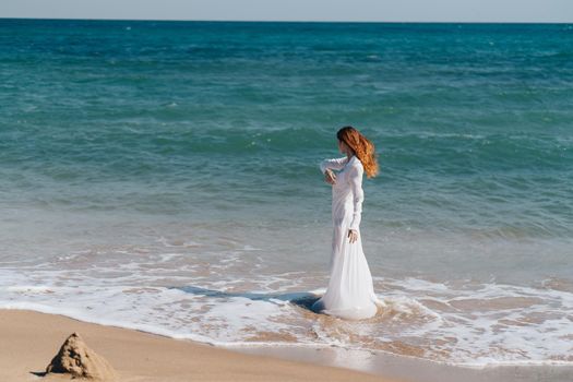 pretty woman sandy beach waves ocean nature travel. High quality photo