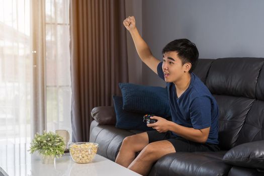 man playing video games and wins