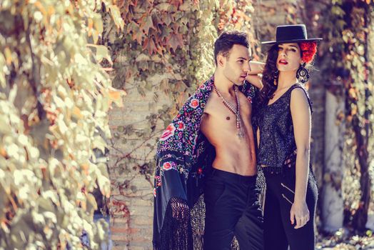 Beautiful couple, models of fashion, wearing spanish clothes