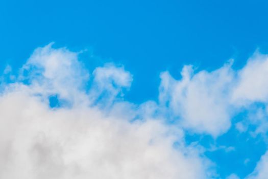 Large white clouds atmosphere and air against the blue sky background
