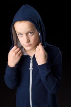 Portrait of cool boy in blue hoodie