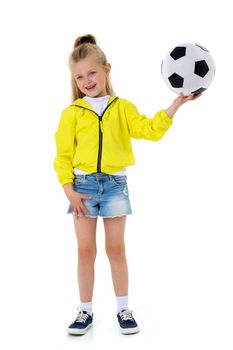 Cute girl playing with soccer ball