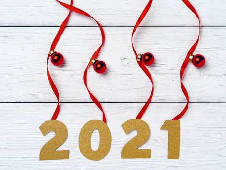 New year greeting background with red ribbons and baubles