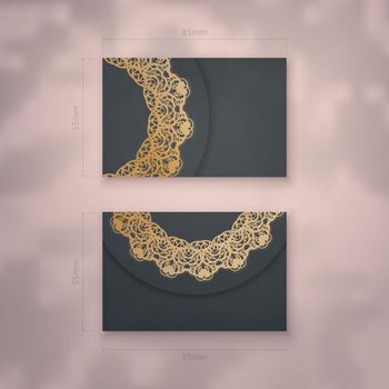 Presentable business card in black with luxurious gold ornaments for your contacts.