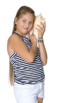 Teenage girl with seashell