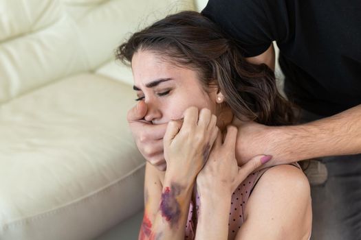 Victim, abuse and domestic violence - Cruel man covers woman's mouth