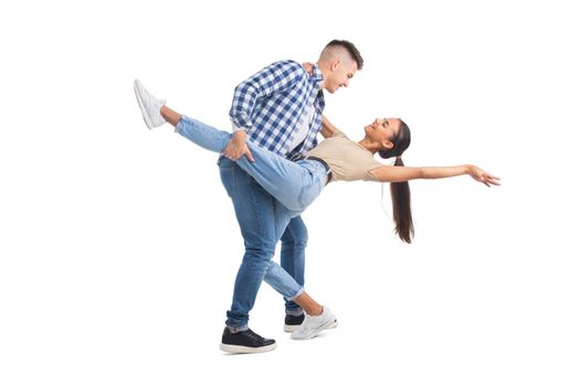 Young man and woman dancing tango
