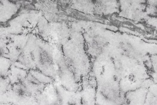Gray stone granite or old marble slab surface with abstract dark pattern texture background
