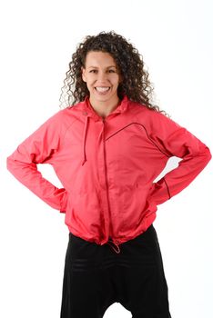 Young cheerful smiling woman in sports wear on white background