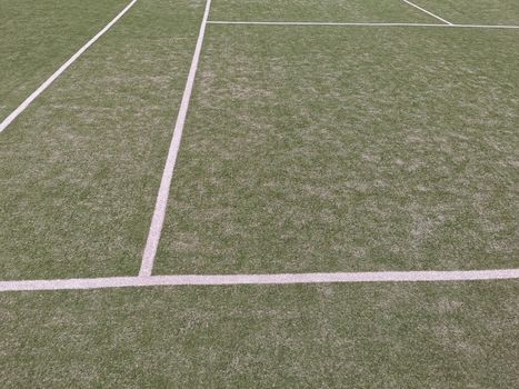 on a court with a racquet