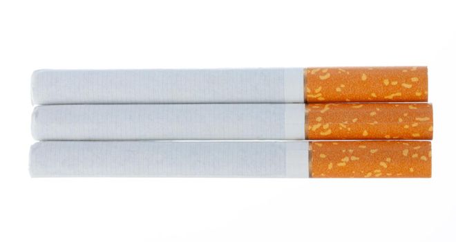 Bunch of unlit cigarettes isolated on white