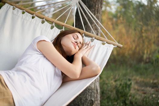 woman sleeping outdoors fresh air vacation travel
