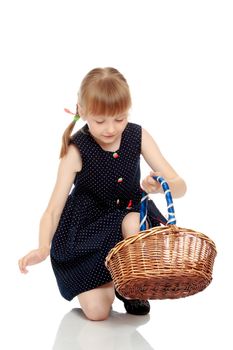 Little girl with a wicker basket