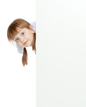 A girl is showing an advertisement on a white banner.