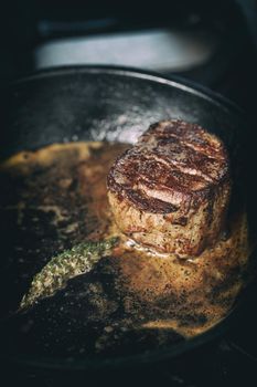Beef steak fried in pan