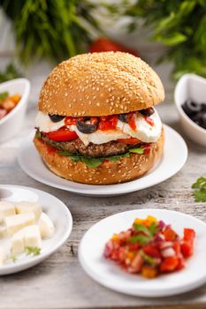 Delicious burgers with beef patty