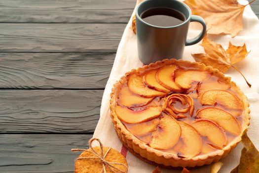 Apple tart pie for Thanksgiving celebration on wooden table close up