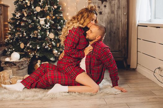 Young couple enjoying a romantic evening on Christmas eve