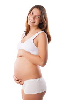 Beautiful belly of young attractive pregnant woman